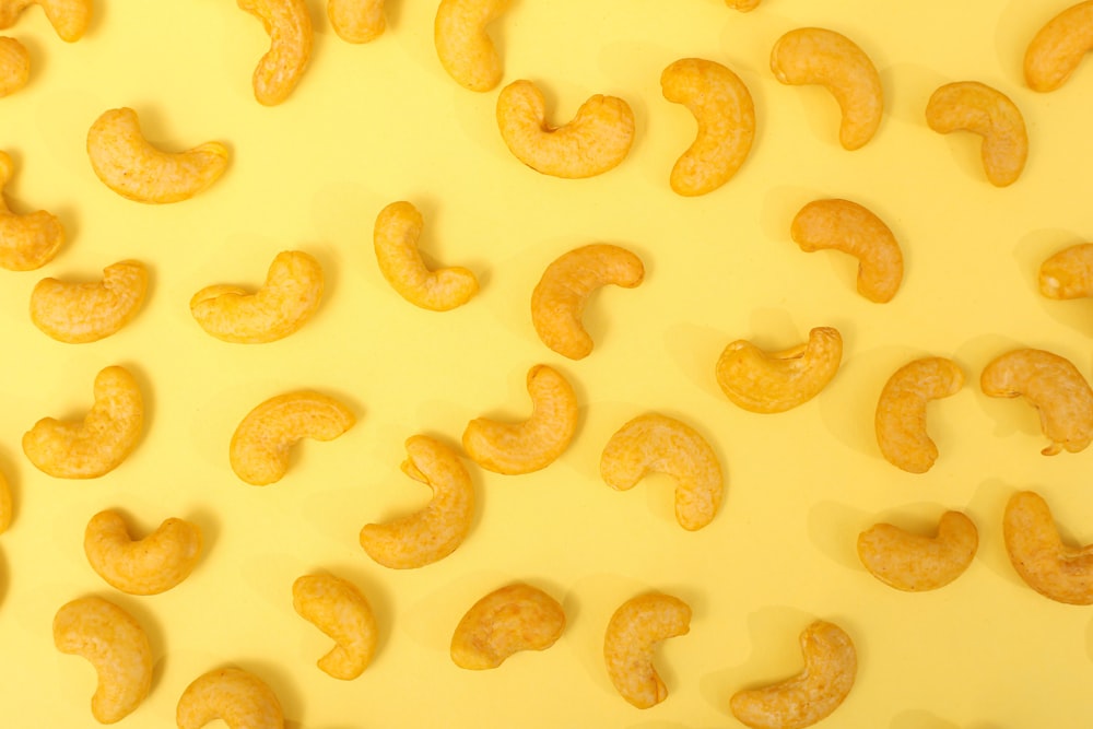 a close up of a bunch of food on a yellow background
