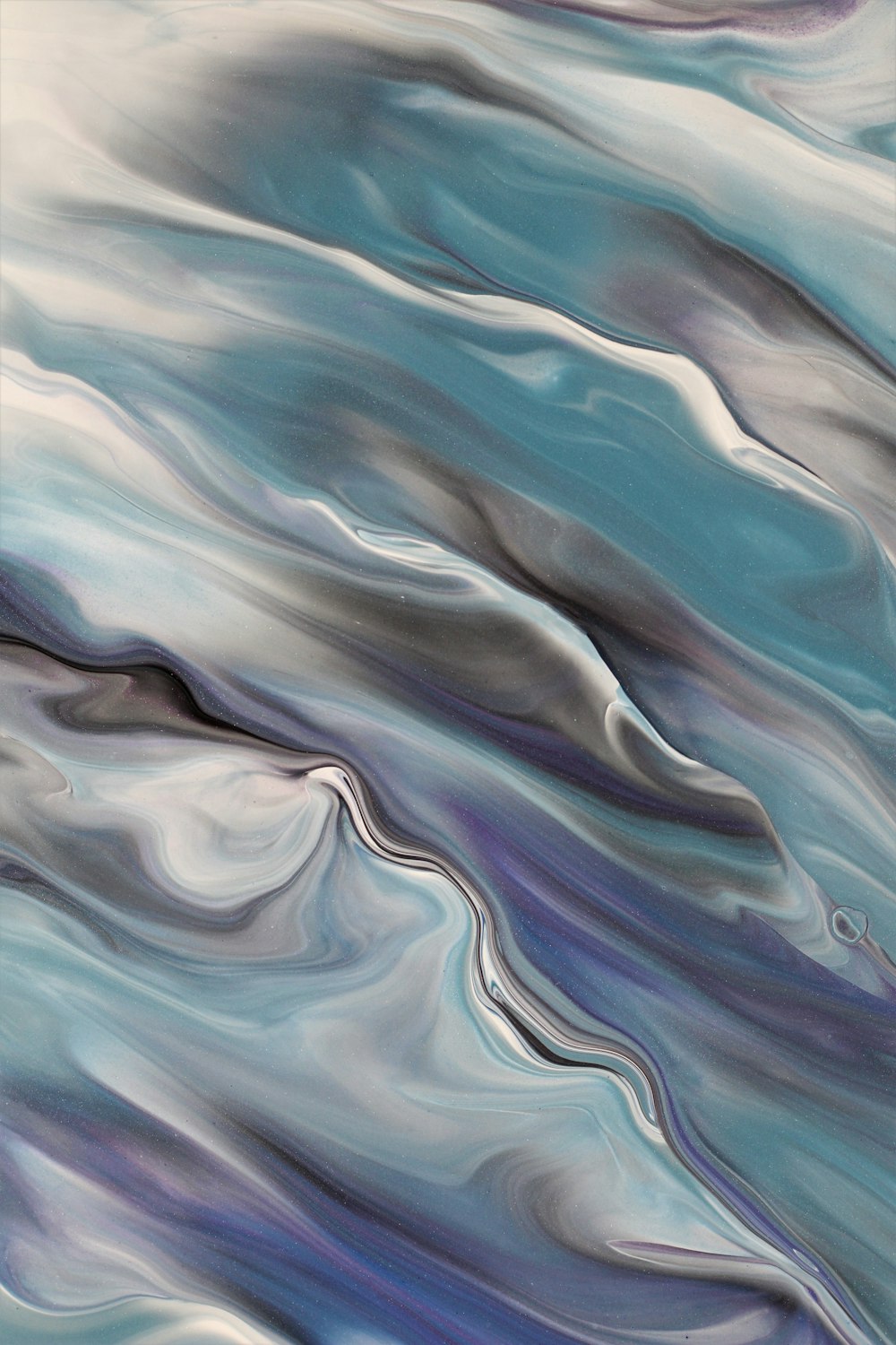 an abstract painting with blue and white colors