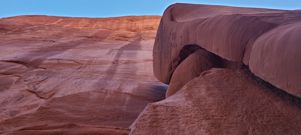 a rock formation in the middle of a desert