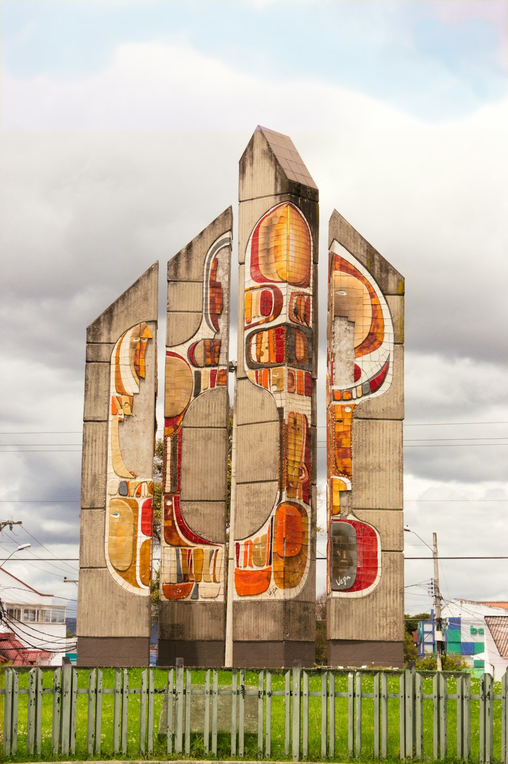 a large building with a giant mural on it's side