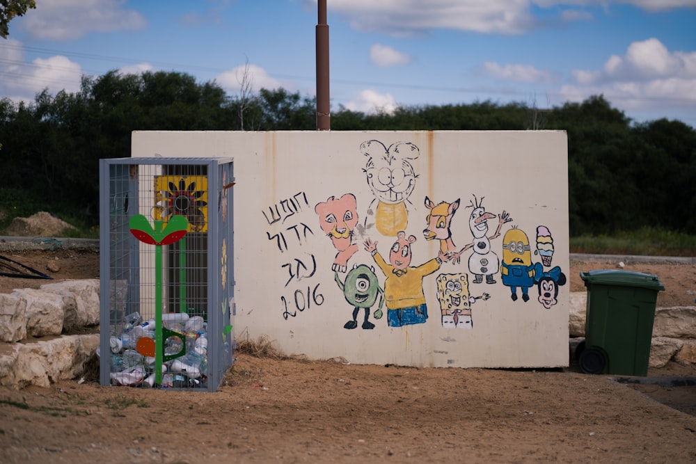 a wall that has some graffiti on it