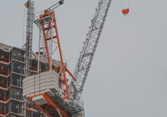 a crane that is on top of a building