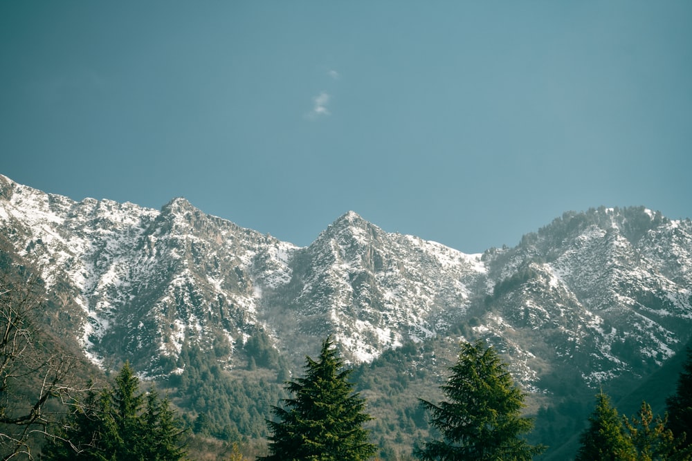 a view of a mountain range with snow on it