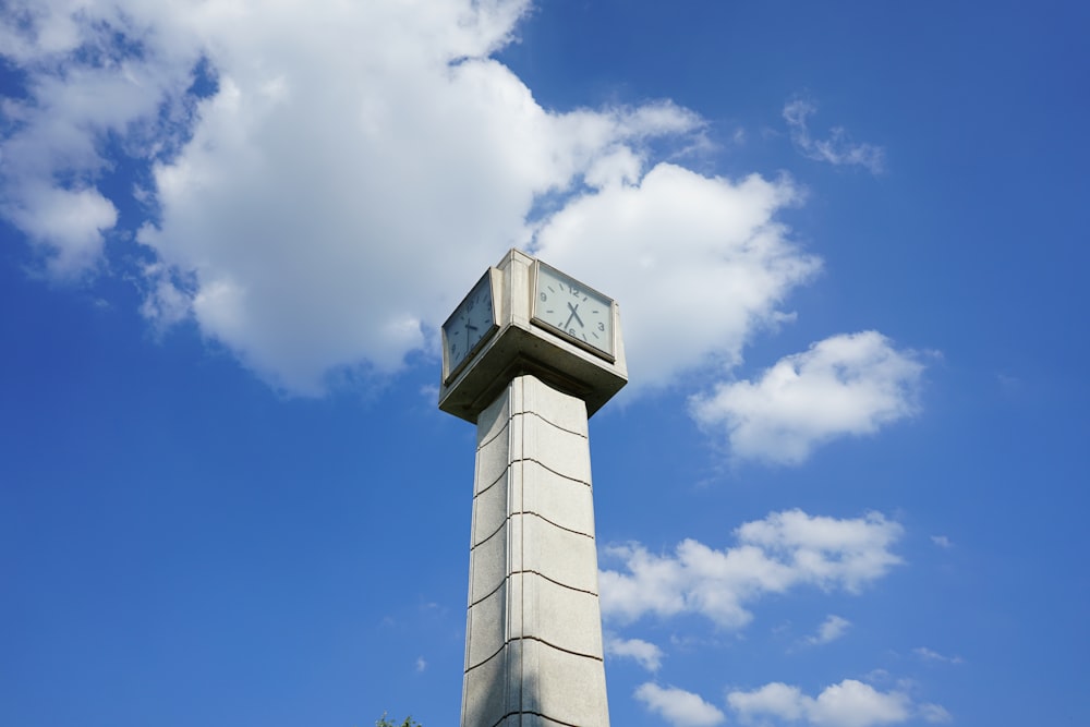 a tall clock tower with a sky background