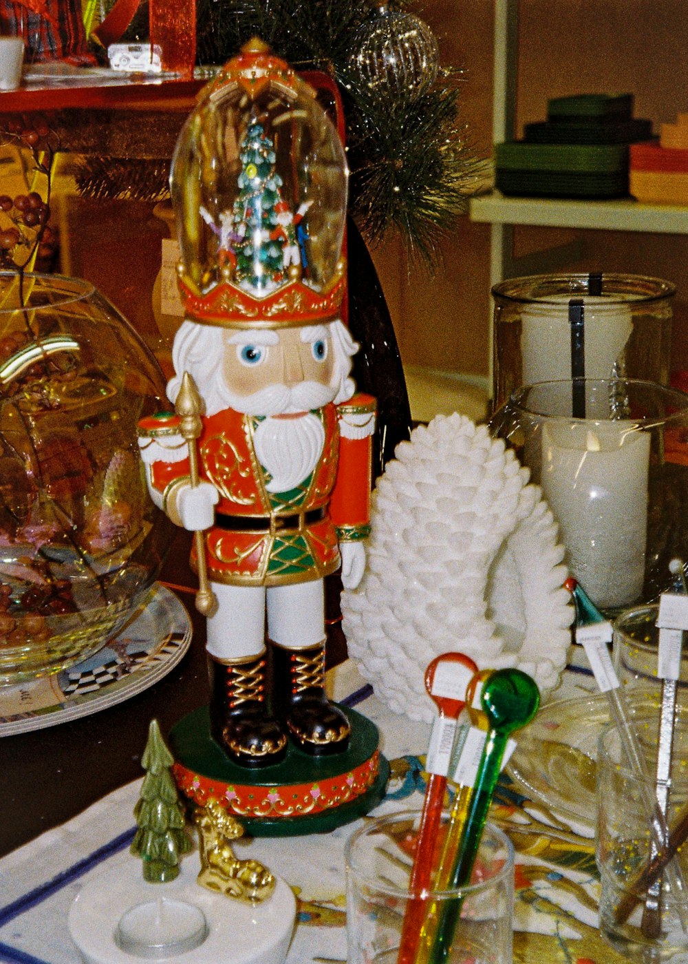 a nutcracker figurine sitting on top of a table