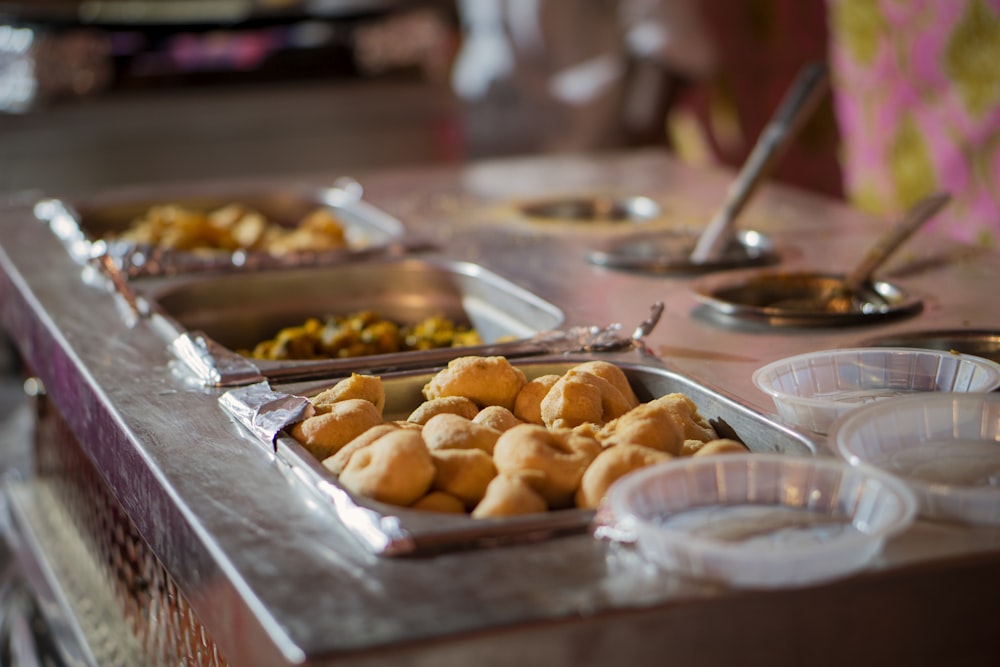 a buffet table filled with different types of food