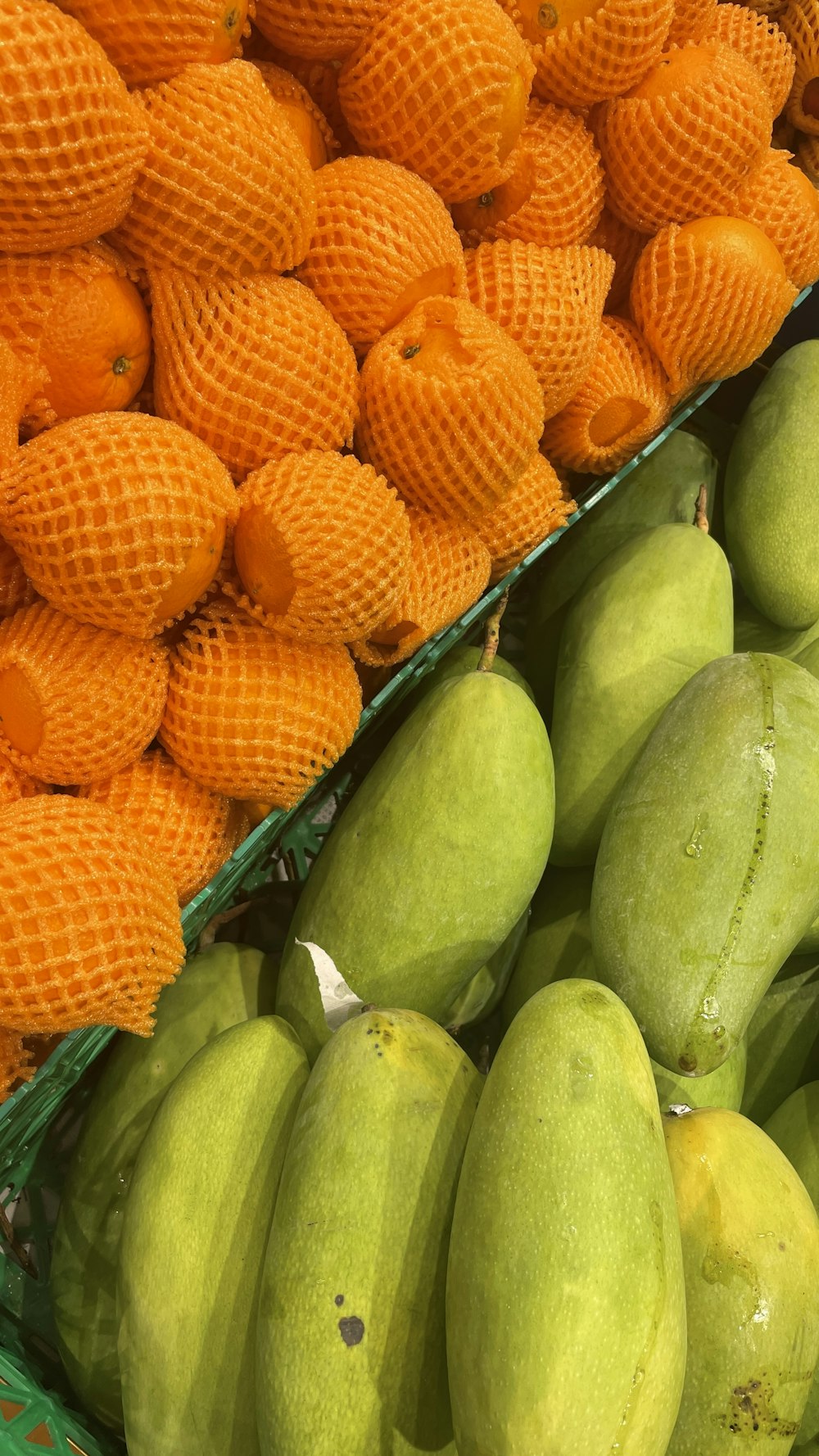 a display of different types of fruit in baskets