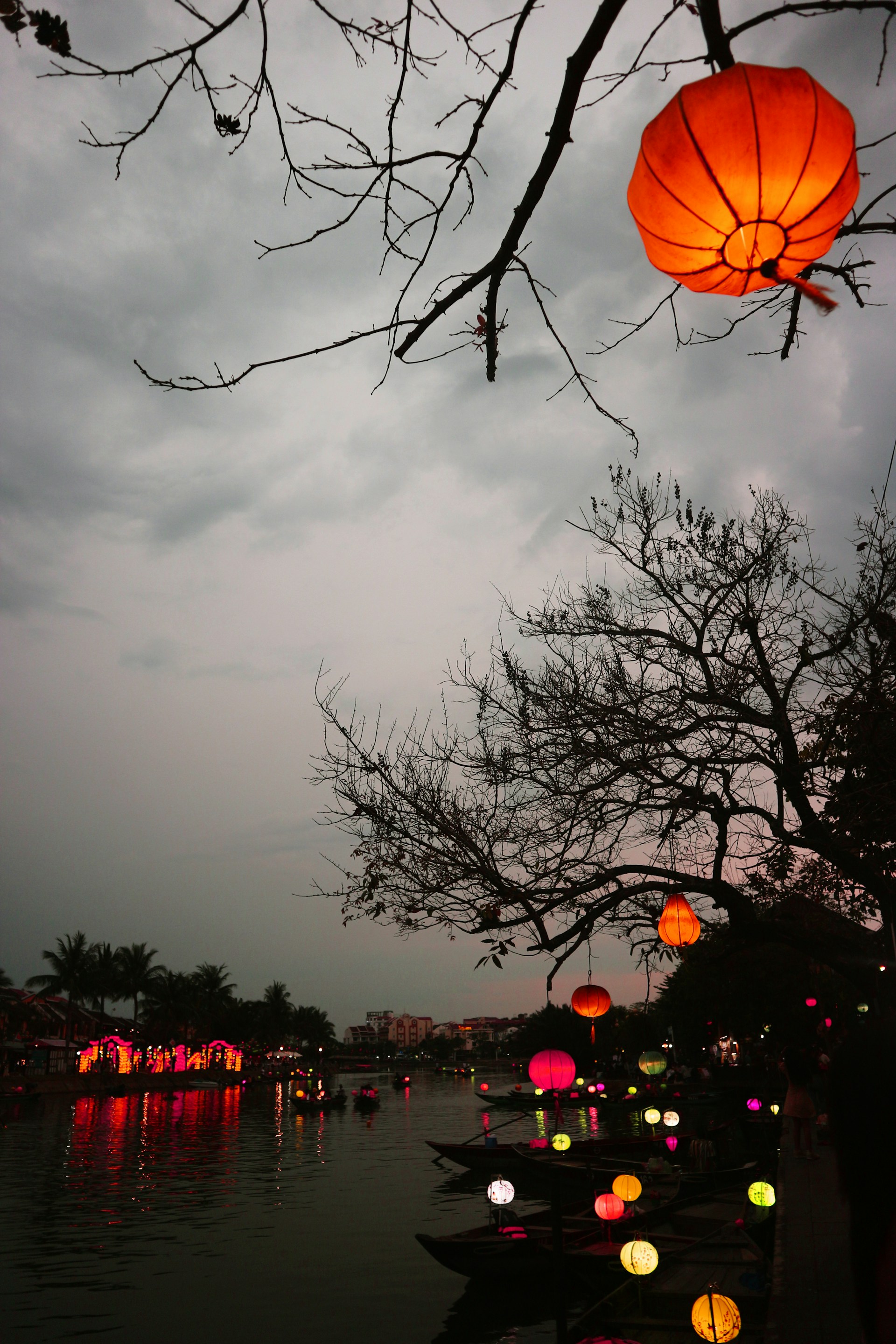 woman wearing yellow long-sleeved dress under white clouds and blue sky during daytime