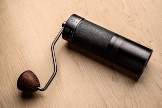 A premium coffee grinder showcasing its sleek design and high-quality materials.