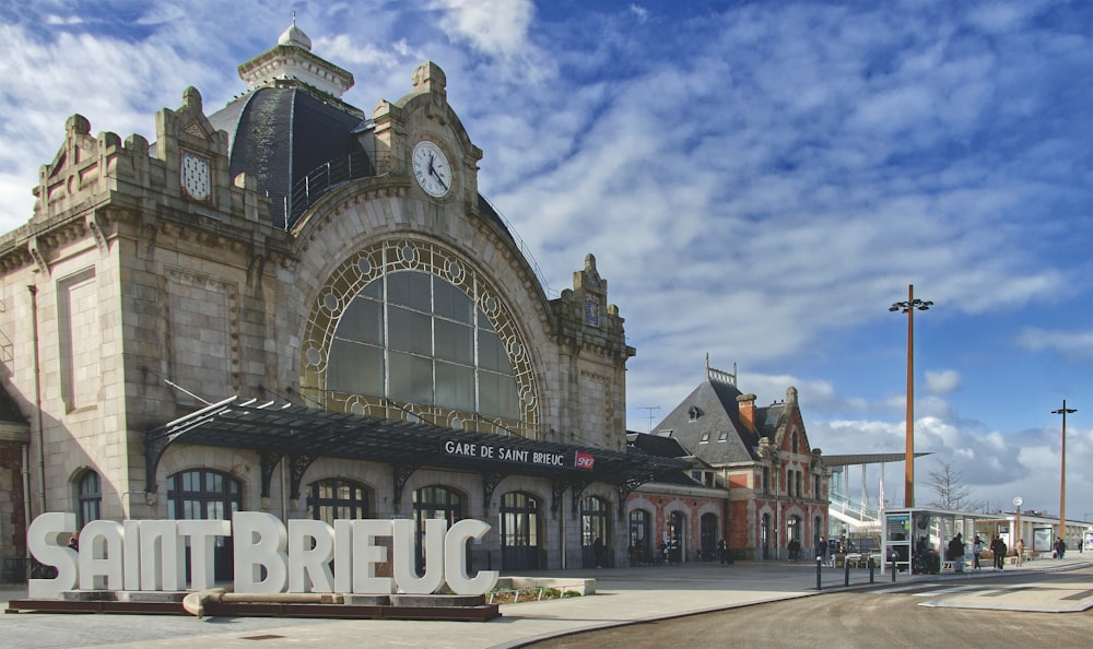 a large building with a clock on the front of it