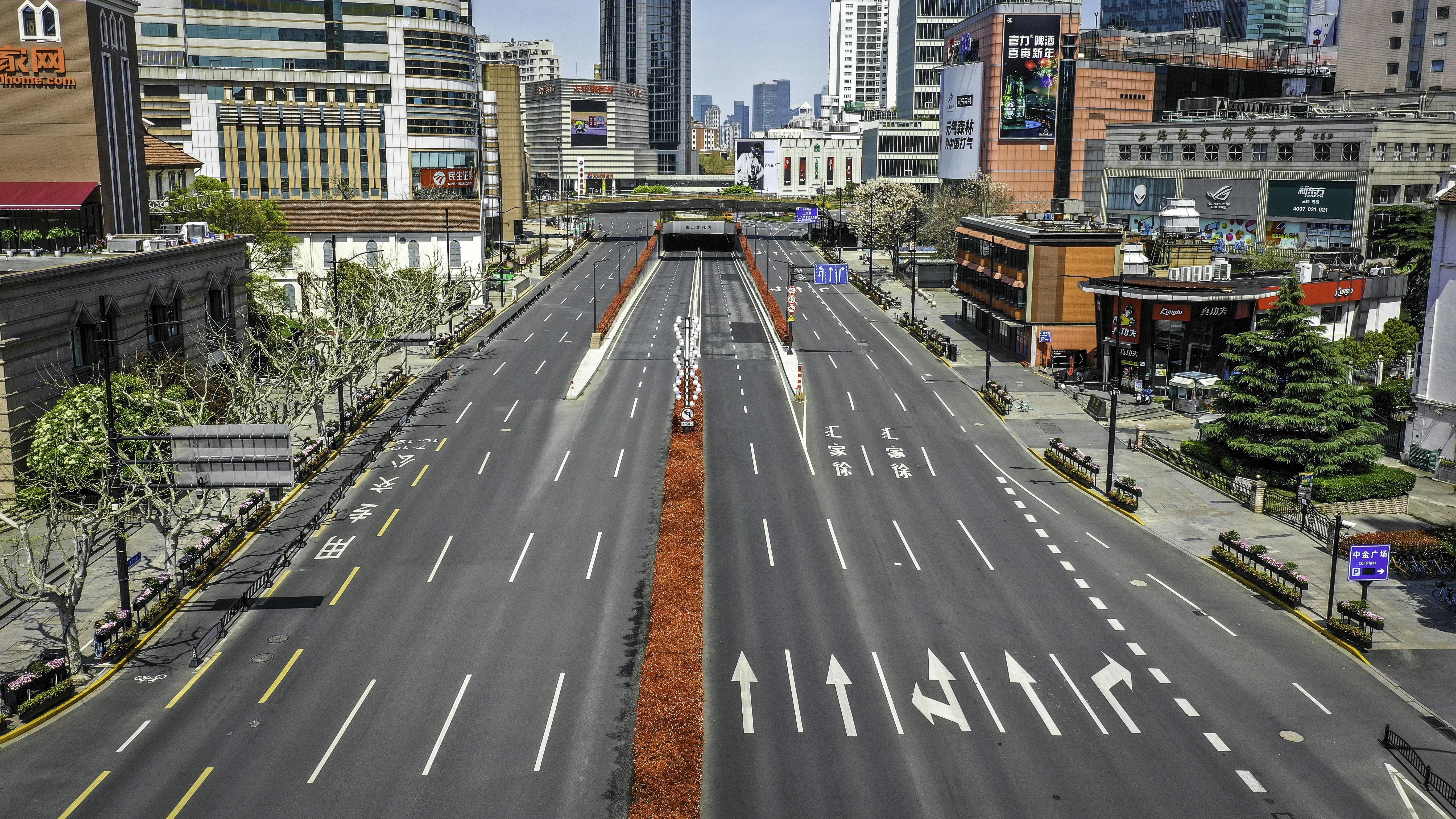 an empty street in the middle of a city