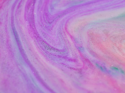 Seasonal nail art with shimmering soft gradients and subtle sparkle details.