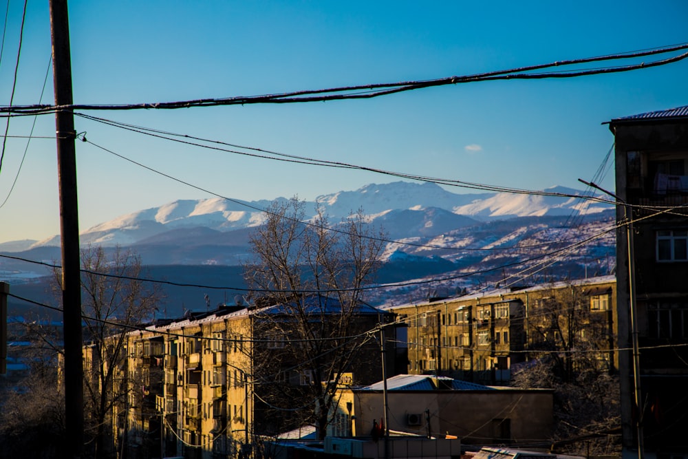 a view of a snowy mountain range in the distance