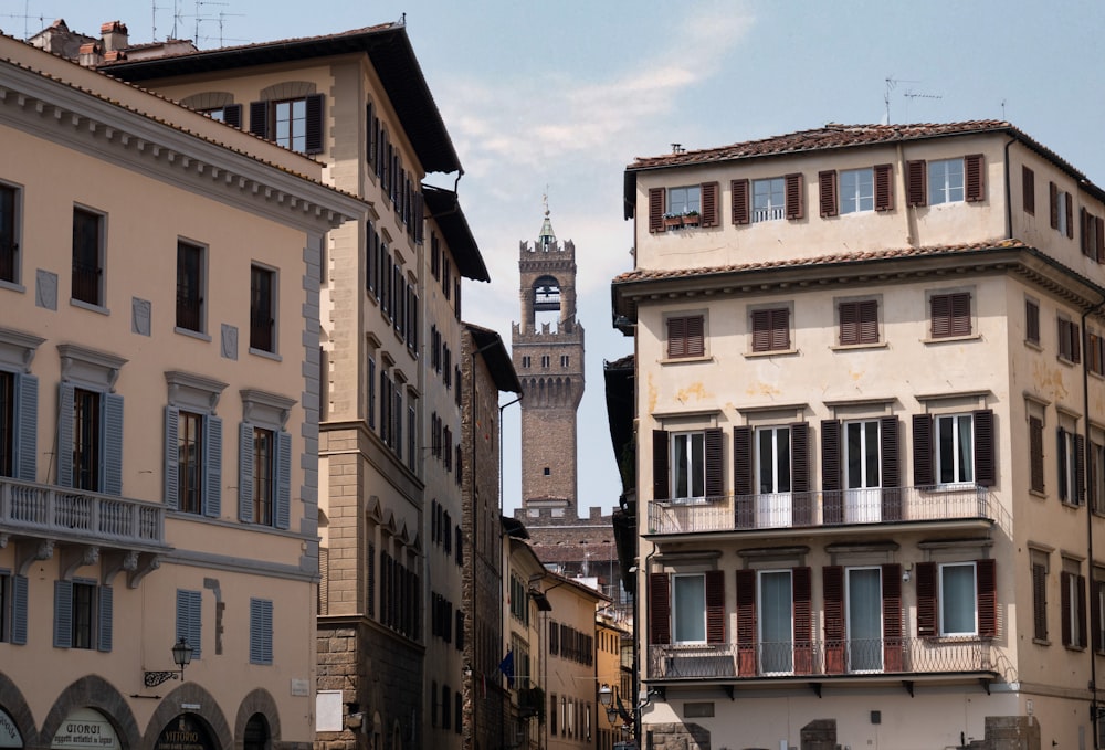 a tall clock tower towering over a city