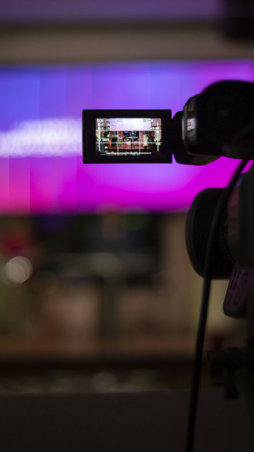 a close up of a video camera with a blurry background