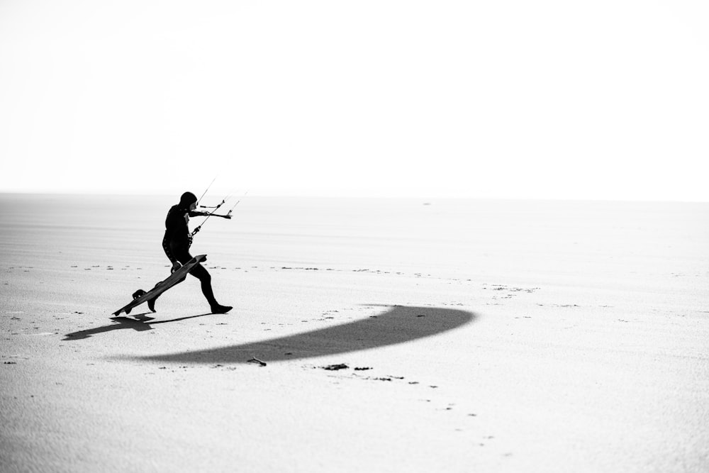 a man running across a snow covered field