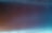 A gradient transition from warm orange tones at the bottom to cooler blue tones at the top, creating a smooth color shift in the image.