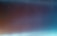 A gradient transition from warm orange tones at the bottom to cooler blue tones at the top, creating a smooth color shift in the image.