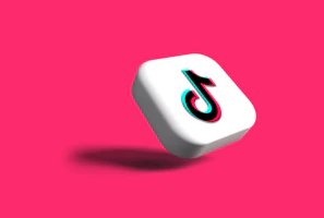 a white dice with a black number on it