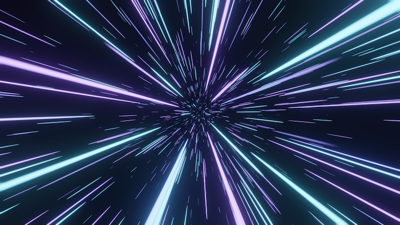 a purple and blue background with lines of light