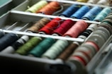 Close-up of colorful sewing trims and buttons neatly arranged.