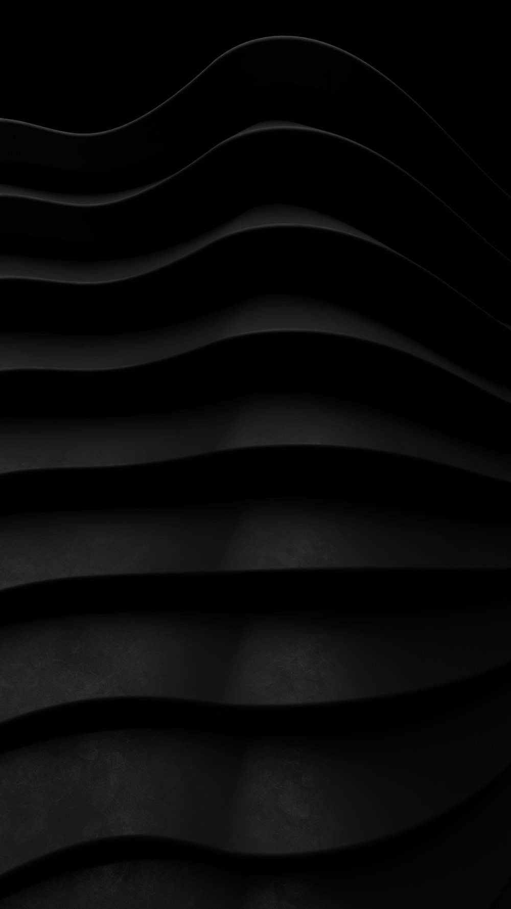 a black and white photo of wavy lines