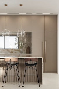 Elegant stools arranged around a modern kitchen island.
