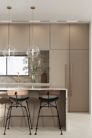 An elegant kitchen island with stylish bar stools.