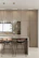 Close-up of a sleek work island with integrated storage and ergonomic seating.