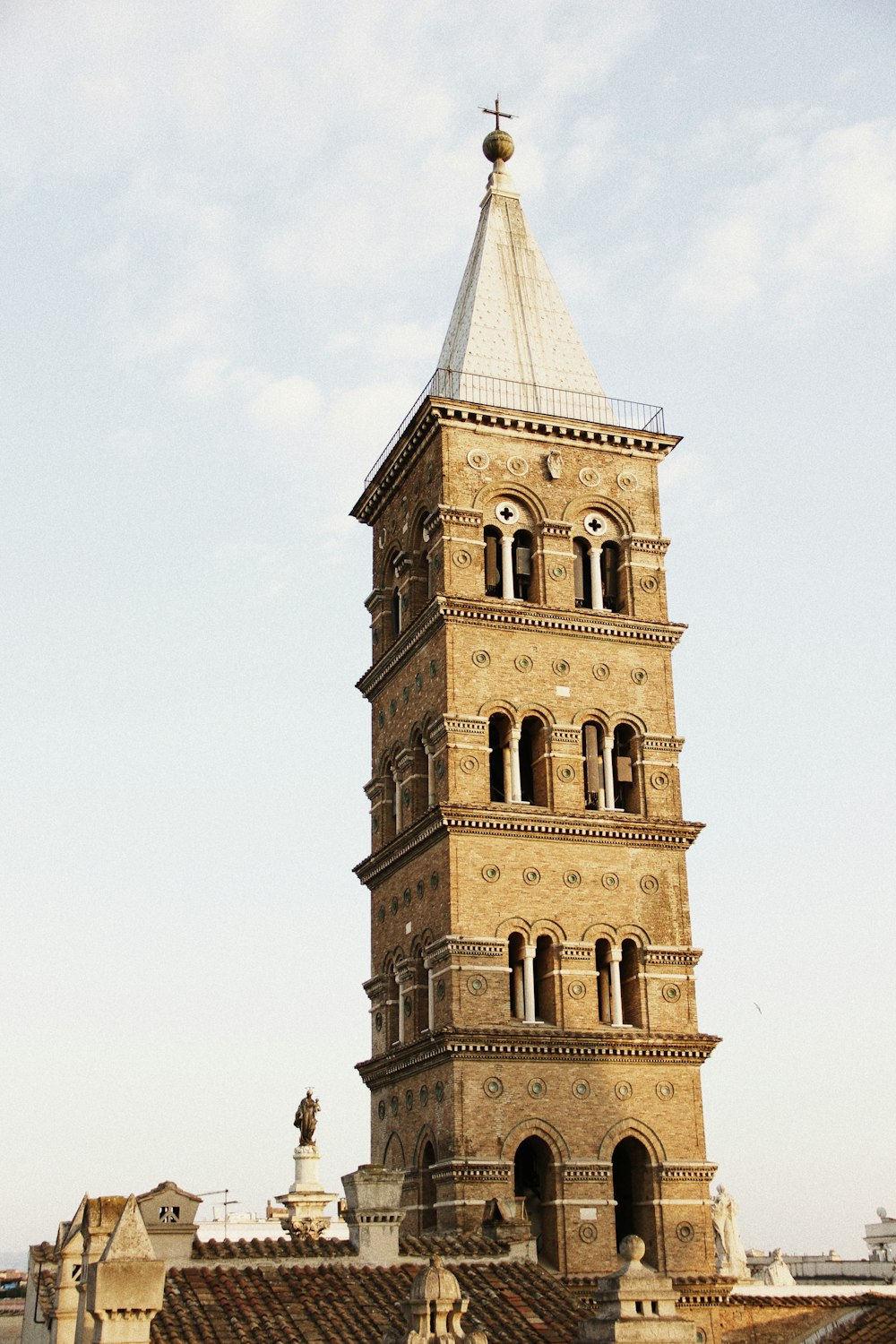 a tall tower with a clock on the top of it