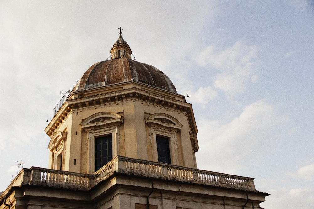 a tall building with a clock on the top of it