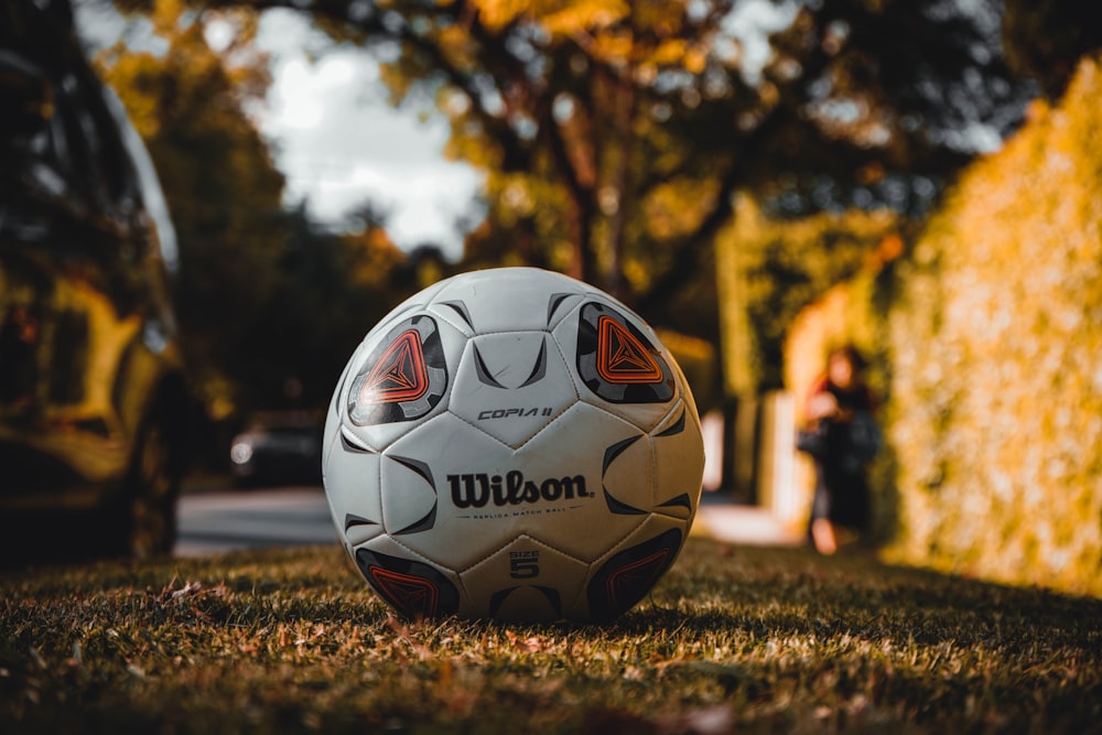 a close up of a soccer ball on the ground