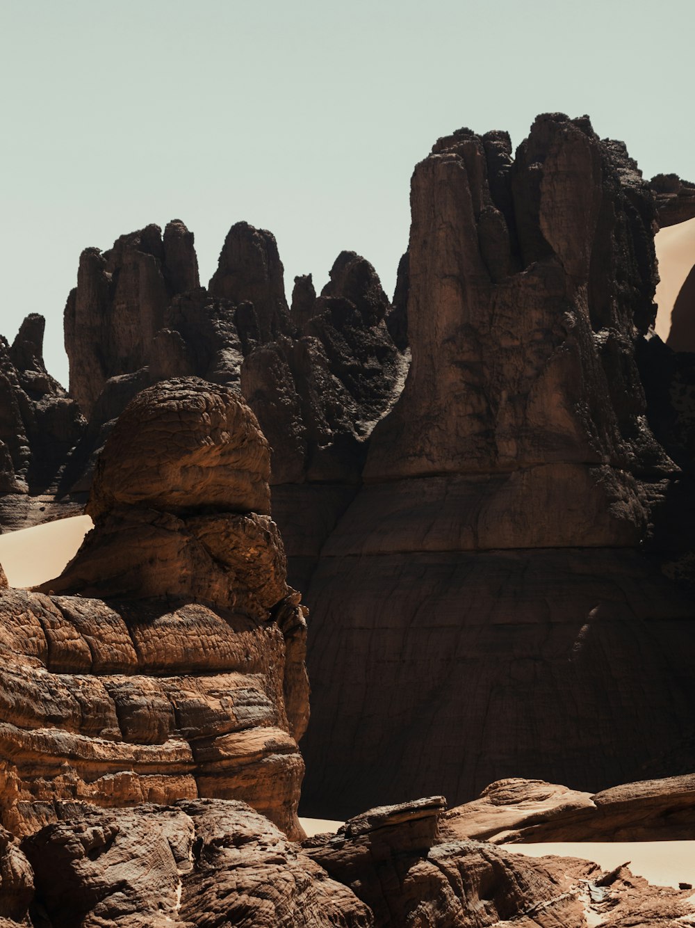 a desert landscape with rocks and sand