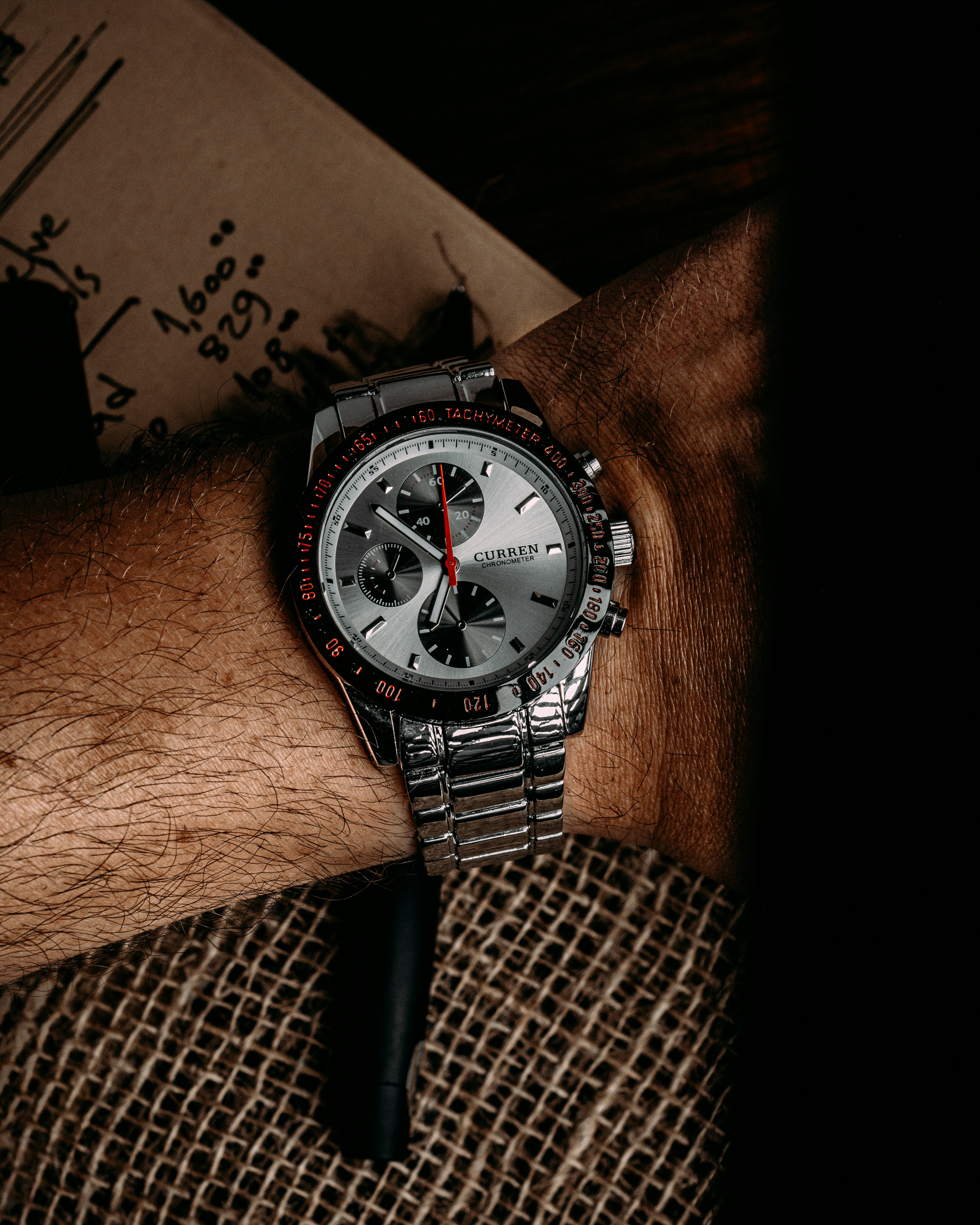 A man wearing a watch on his arm photo Free Brown Image on Unsplash