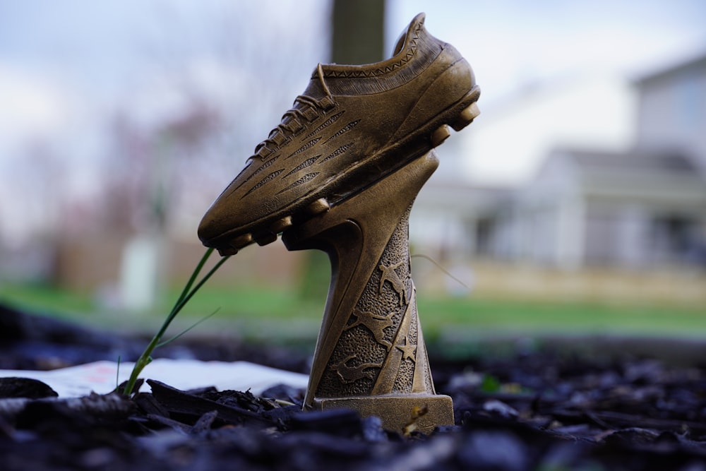 a close up of a shoe on the ground