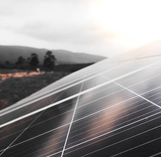 a close up of a solar panel on a cloudy day