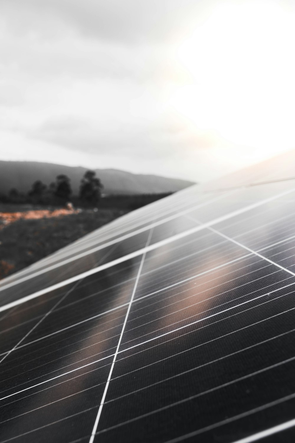 a close up of a solar panel on a cloudy day