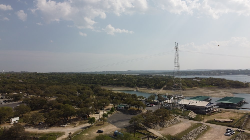 an aerial view of a lake and power lines