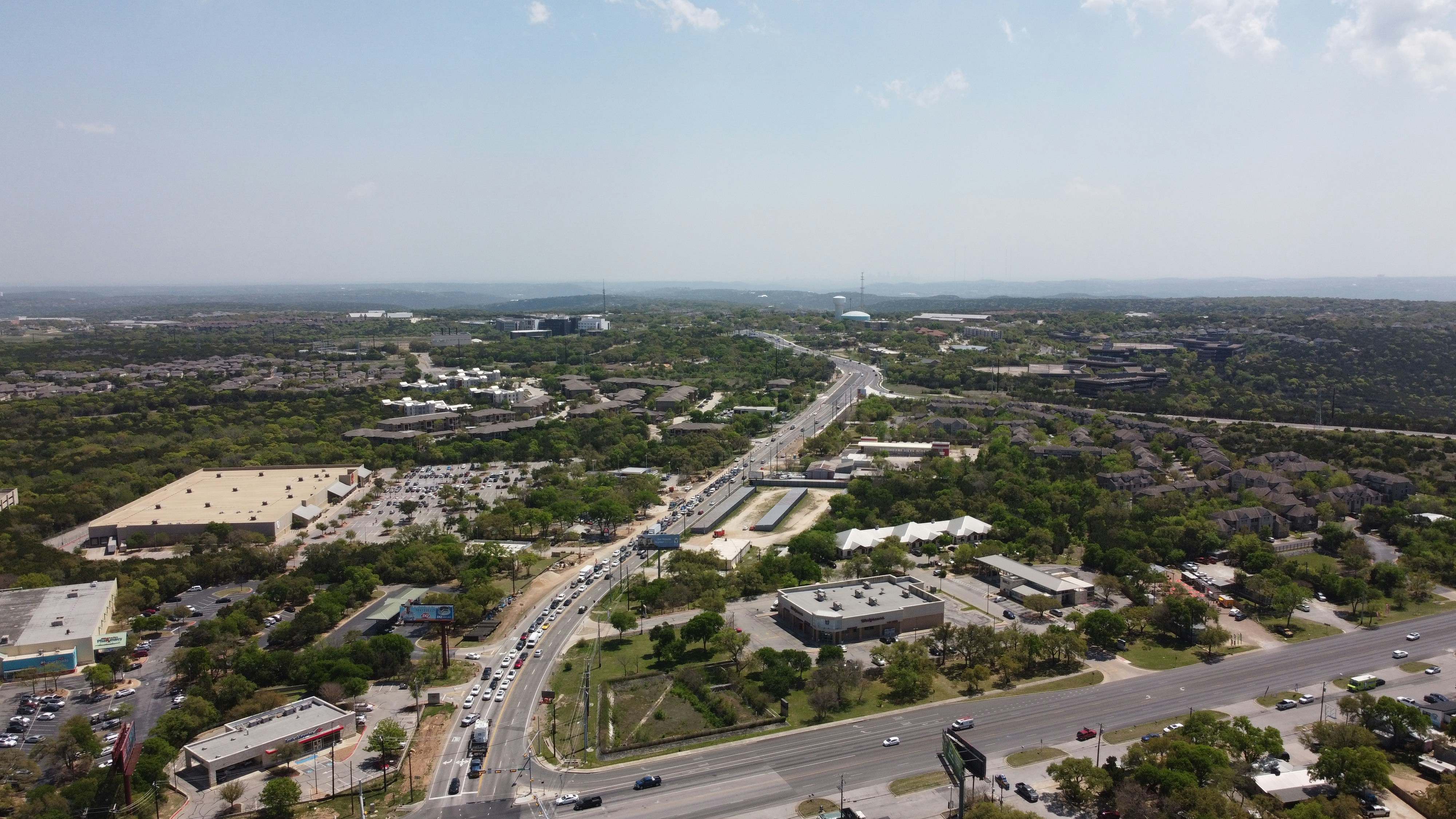 an aerial view of a city with lots of traffic