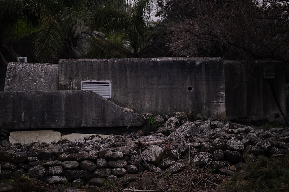 there is a concrete structure with a window in it