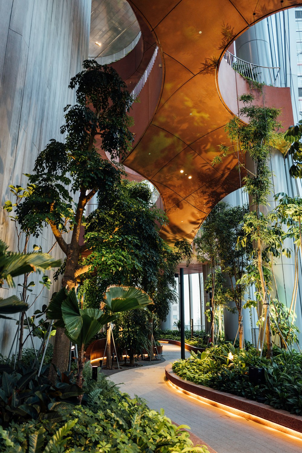 a building with a lot of plants inside of it