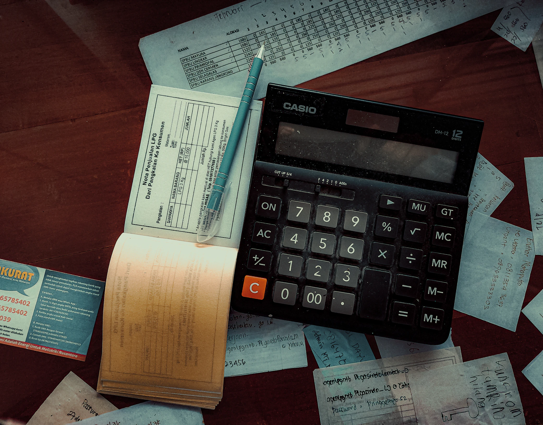Insurance documents and calculator for comparing monthly insurance costs