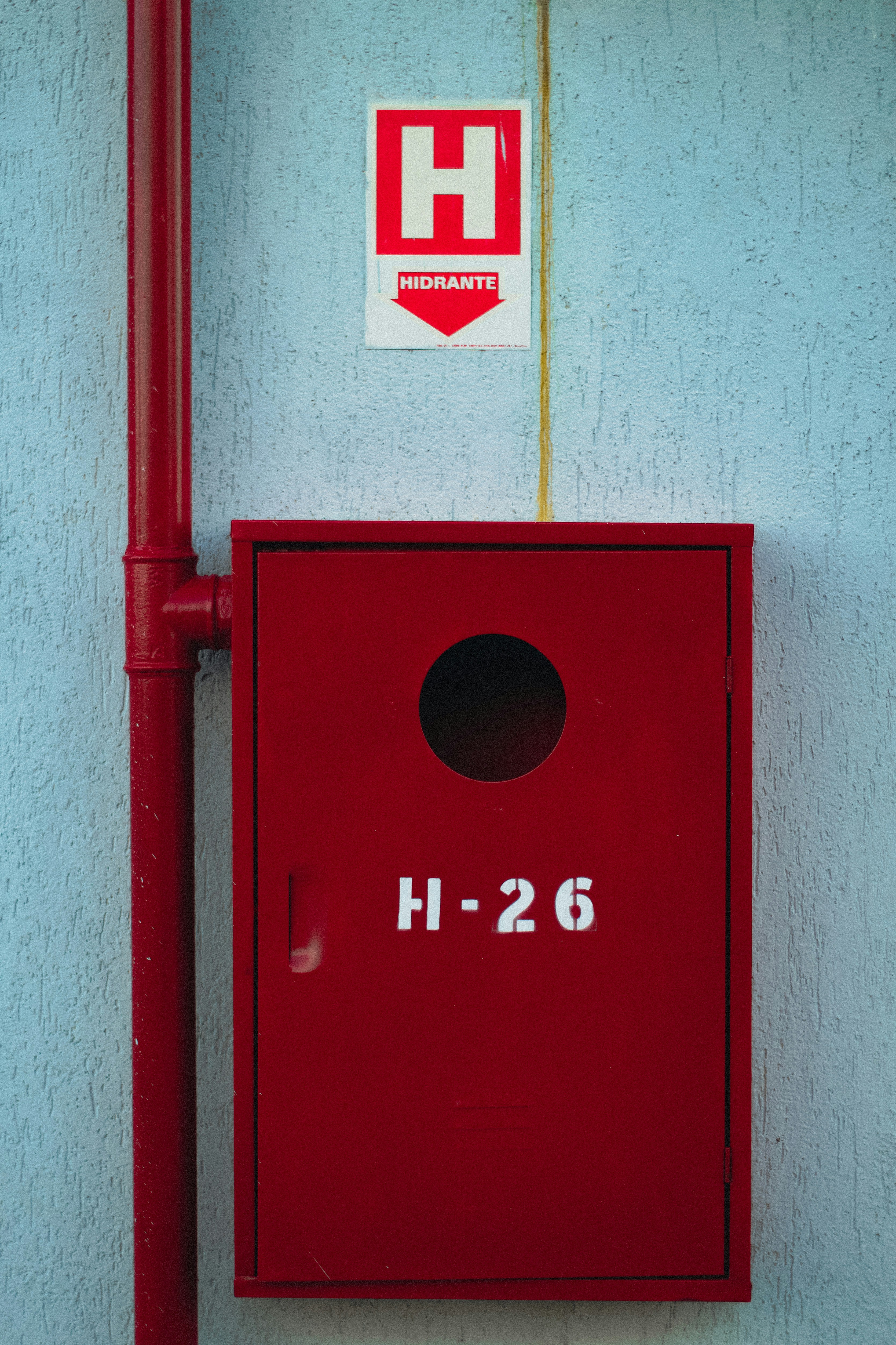woman wearing yellow long-sleeved dress under white clouds and blue sky during daytime