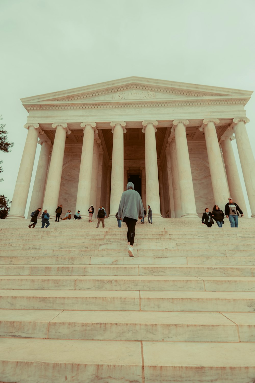 a group of people walking up and down some steps