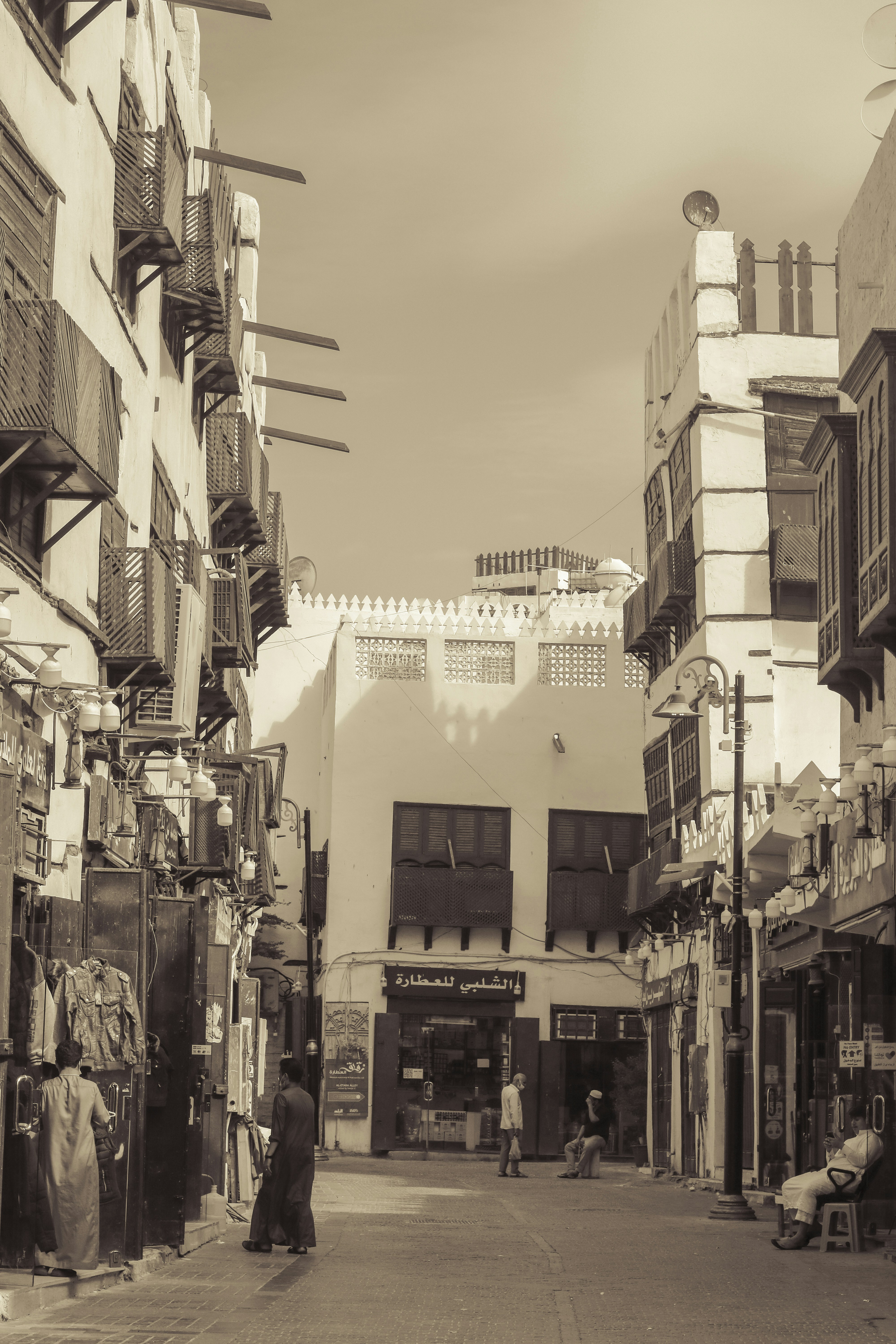 an old photo of a street in a city