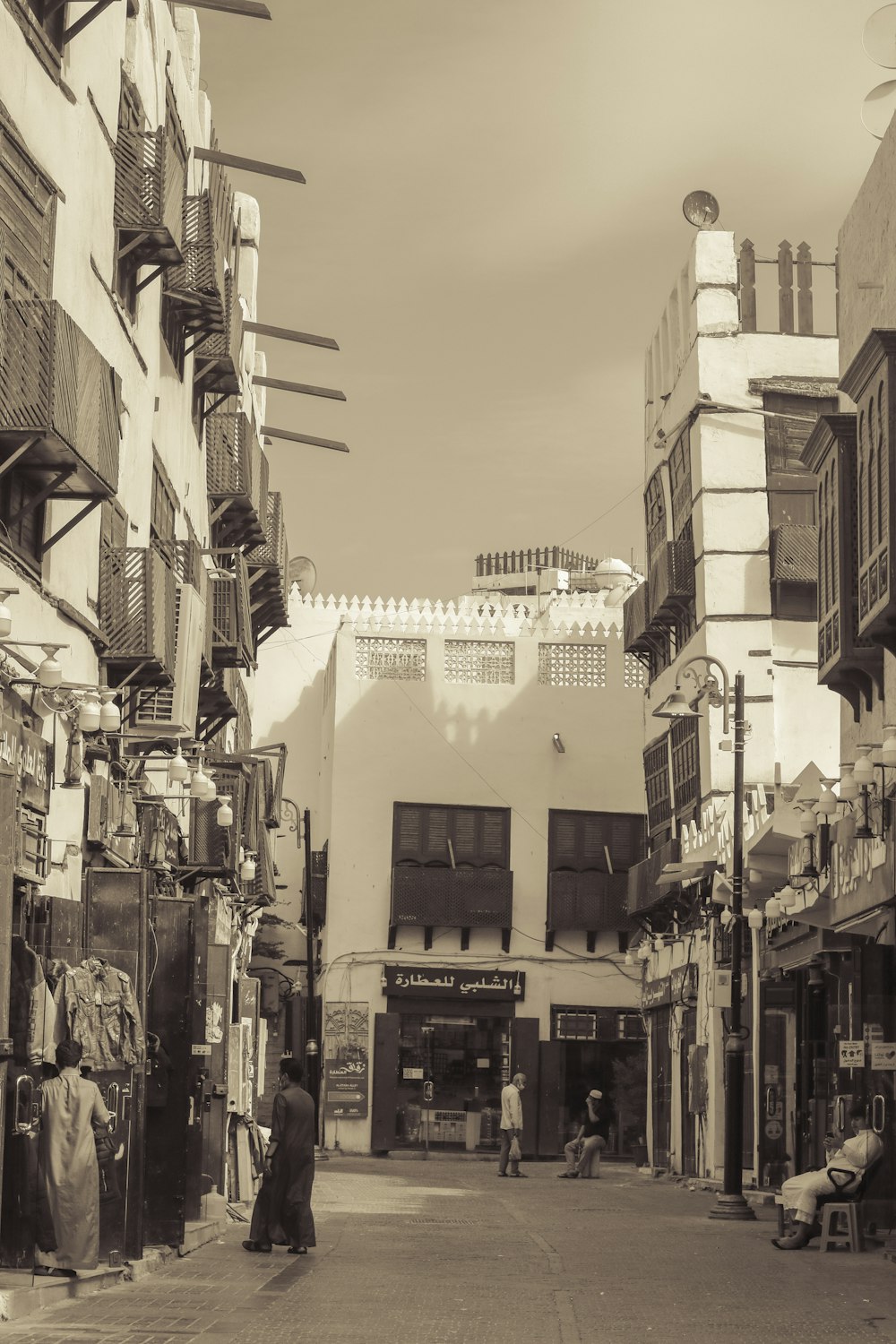 an old photo of a street in a city