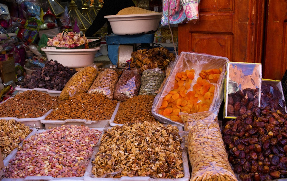 a variety of nuts and dried fruits for sale