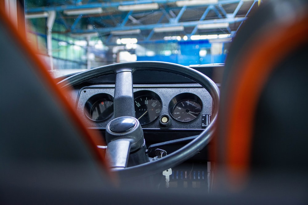 a steering wheel and dashboard of a vehicle