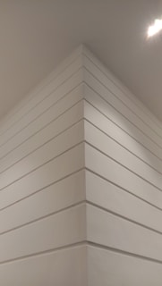 A close-up of a freshly painted interior wall in a modern home.