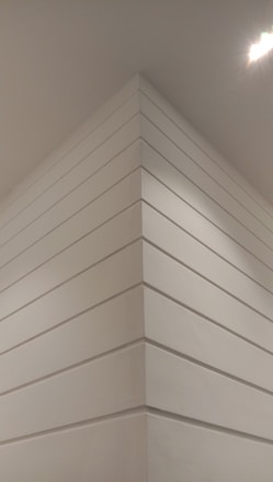 A beautifully finished interior space showcasing drywall installation.